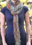 Shawl looped as a scarf