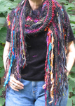 Petite shawl wrapped around the neck as a scarf